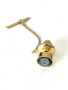 Gray faceted glass gold-tone tie pin